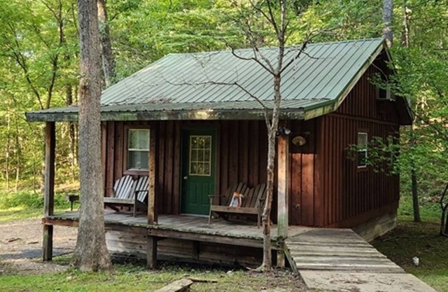 Cabine 1 chambre confortable avec mezzanine supplémentaire, cuisine complète et coin salon