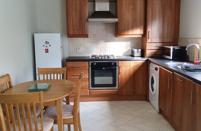 Appartement confortable au rez-de-chaussée moderne à 20 minutes de Glasgow Centre