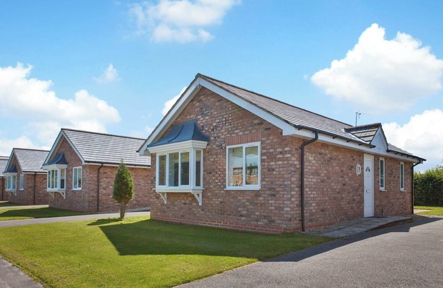 Comfortable modern cottage with one double and one with adult size bunks.