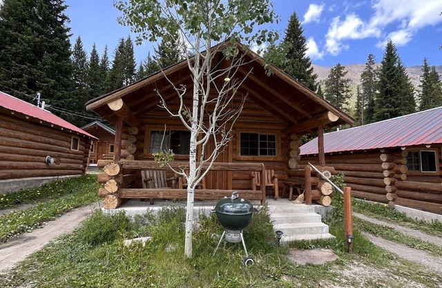 Comfy cabin is situated on the Silver Gate property which overlooks 10,000ft tall mountain peaks surrounding the town.