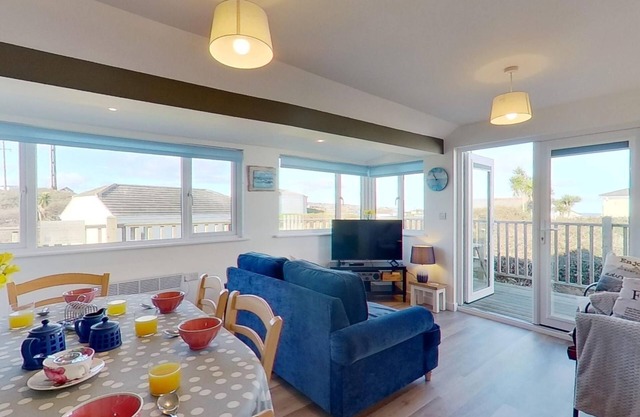 Completely refurbished and offers a bright and airy space, with a wonderful wrap around deck