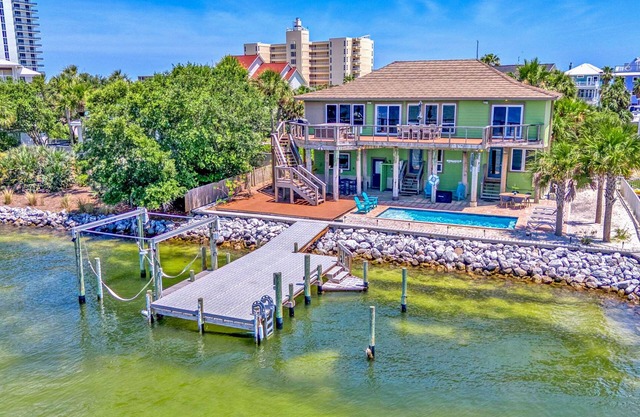 Contemporary coastal waterfront Home w/ private pier & pool! Gorgeous views!