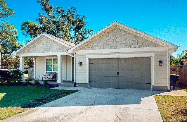 Contemporary dog-friendly retreat with pool & patio - near shops & attractions