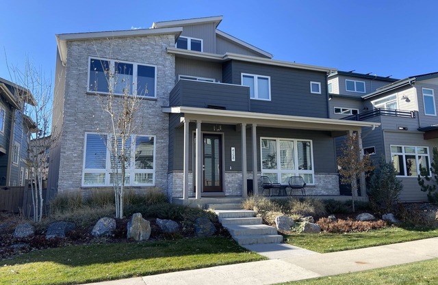 Contemporary executive home with views of the Flatirons from rooftop!