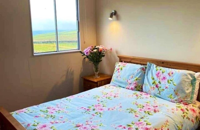 Converted container cabin set in a 40 acre farm with stunning panoramic views