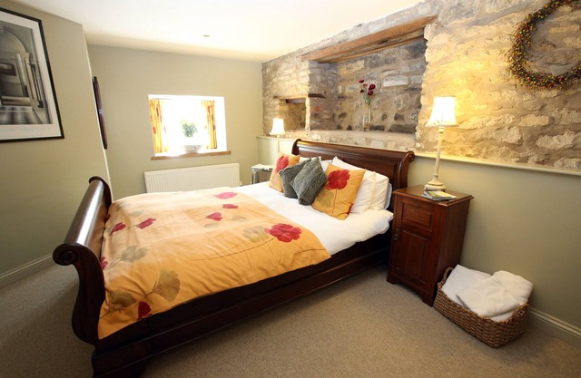 Converti Cottage Mews stable avec un Kingsize Sleigh Bedded Chambre