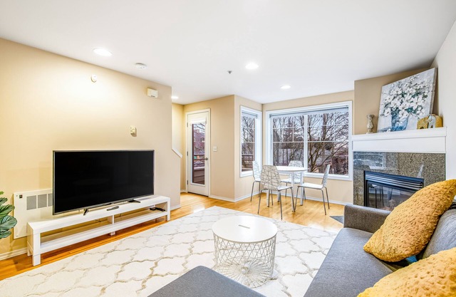 Corner Townhome with Deck, Tons of Natural Light, WiFi, & Gas Fireplace