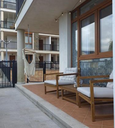 Costa Foz Apartment Playa de Llas, terraza, piscina y pista de pádel