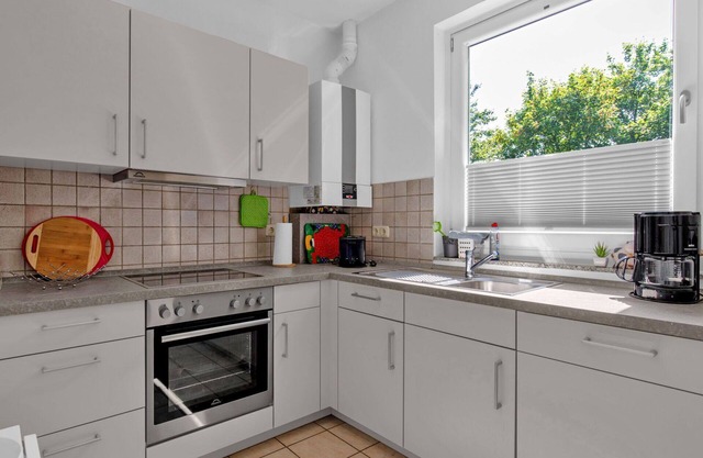 Confortable appartement pour 6 personnes avec WIFI, TV, terrasse, animaux admis et parking