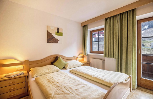 Appartement confortable "Waldblick Oberachrain" avec vue sur les montagnes, balcon et jardin