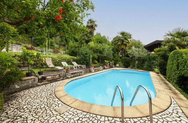 Joli appartement avec climatisation, WIFI, piscine, TV, patio, animaux admis et parking