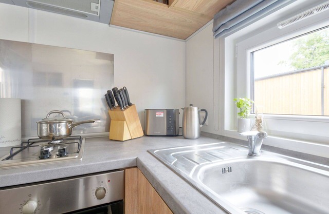 Agréable appartement dans une maison de vacances avec WIFI, TV, animaux admis et parking