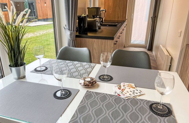 Joli appartement dans une maison de vacances avec WIFI, TV, terrasse et parking