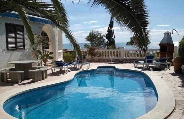 Cottage sur la plage - vue incroyable sur la mer - piscine privée