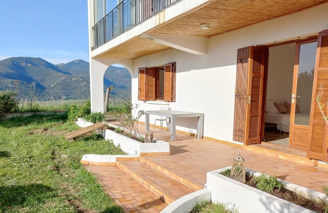 Maison avec grand jardin et une vue magnifique