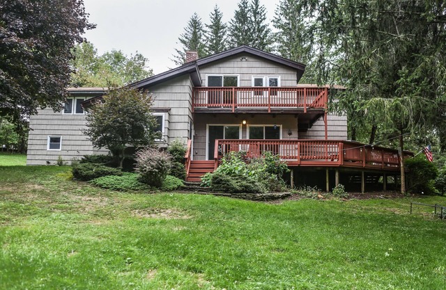5 chambres / 5 salles de bain avec étang de 2 acres, plage Pvt, tables de billard / babyfoot, foyer extérieur, sauna