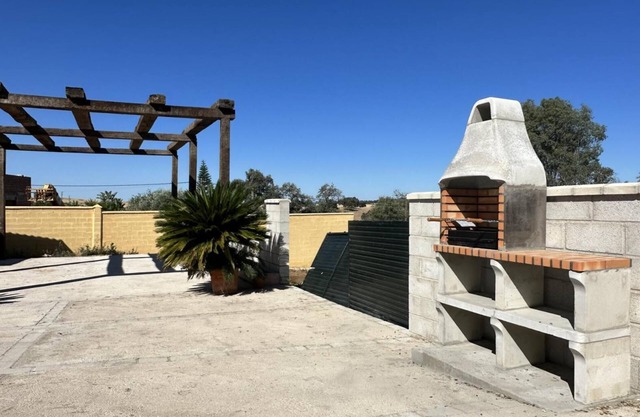 Maison de campagne "Casaruralsevilla La Cabaña De Petra" avec vue sur la montagne et climatisation