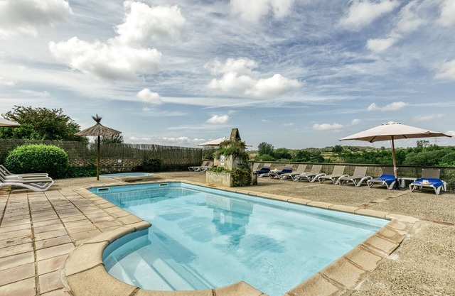 Maison de campagne 'El Rebost Rural De Can Gat Vell' avec piscine partagée, Wi-Fi et climatisation