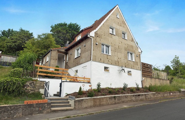 Maison de campagne "Vogelsberger Bett Unser Korkhaus" avec vue sur les montagnes, terrasse et Wi-Fi