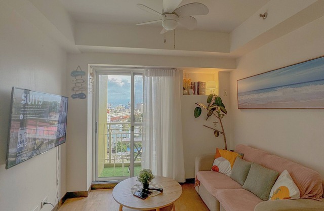 Cozy 1-bedroom condo in wonderful Quezon City with WiFi, AC, Pool view, Netflix