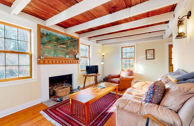 Cozy 1850s home on the riverfront with mountain & river views - dog-friendly