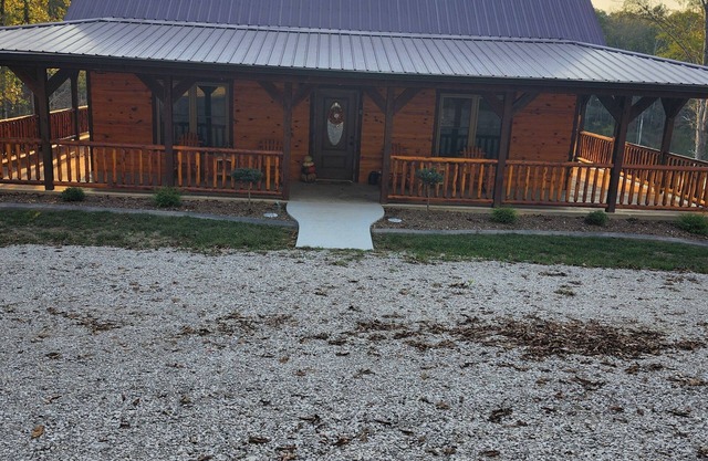 Cozy 4-bedroom cabin with a private lake. Pet Friendly...