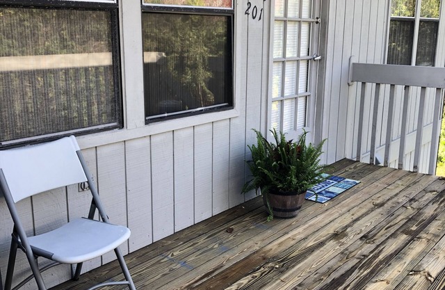 Cozy Beachside town getaway with quiet preserve views.