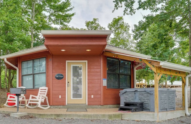 Cozy Bryant Vacation Rental Cabin w/ Hot Tub!