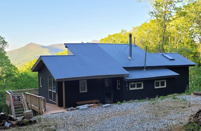Cozy cool cabin in the mountains with a view Close to Downtown with a hot tub