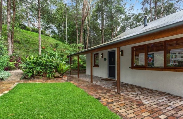 Cozy Cottage on an acreage bush setting closer to amenities.