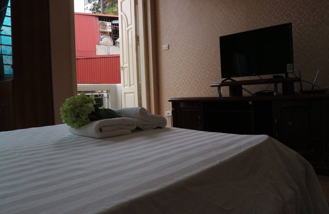 Chambre double confortable avec balcon privé