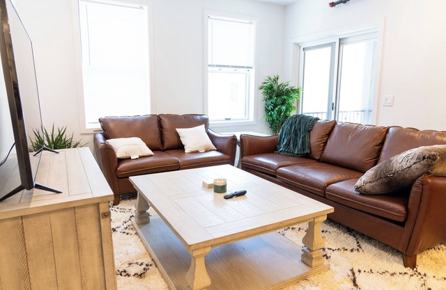 Cozy Downtown Loft: 2BR condo w/ AC, WiFi, Balcony & Free 2-car parking.