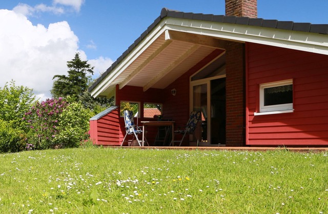 Maison de vacances confortable avec un grand terrain clôturé et WiFi gratuit