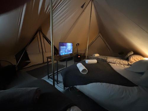 Cozy Hot Tent with Log Burner & Hot Tub Left Tent