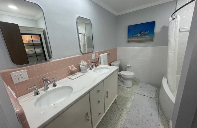 Cozy house one mile from the beach with private heated pool