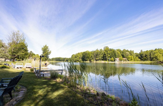 Cozy loft retreat with lake views and amenities.