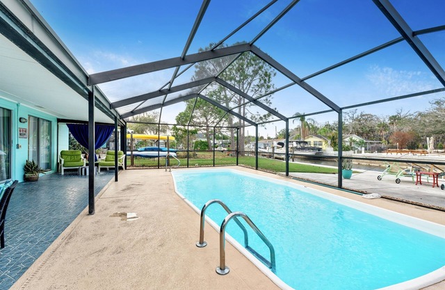 Cozy Oasis Screened Pool Picturesque Water Canal Views!