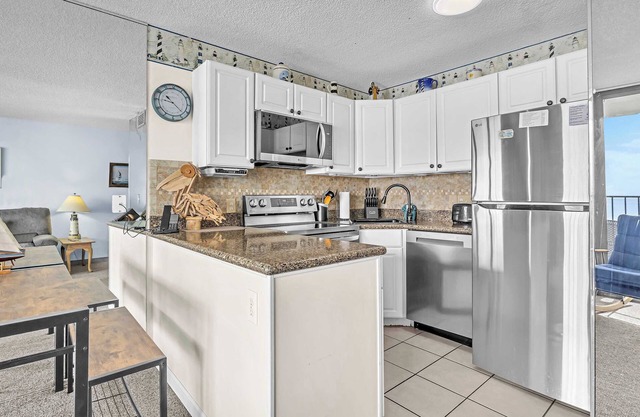 Cozy Oceanfront Condo with Heated Pools & Views
