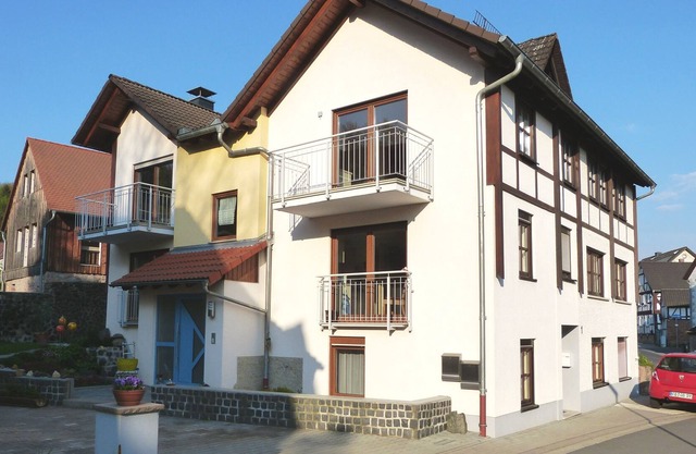 Appartement chambre confortable avec cuisine et salle de bain, comme neuf