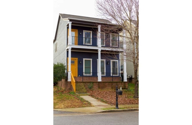 Cozy shotgun style house, centrally located in Northwest Arkansas.