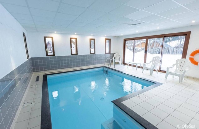 Cozy Ski-in Mountain Retreat w/ Heated Pool & Terrace Views | Indoor Pool