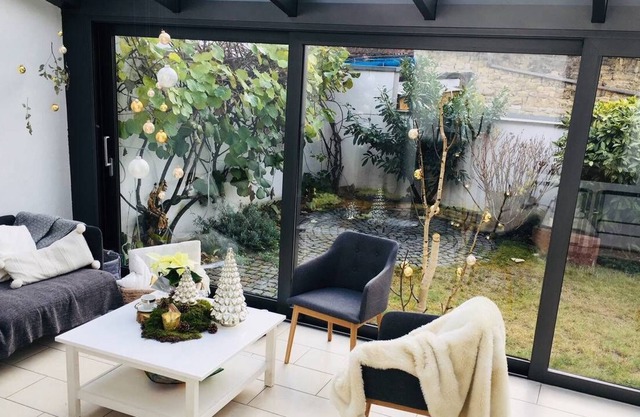 Maison de ville confortable avec cour privée et jardin
