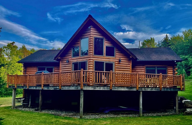 Experience the rustic charm of a log cabin chalet nestled on 14 private acres.