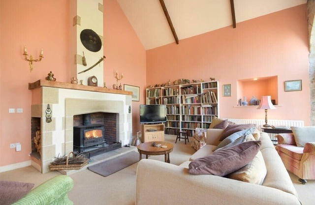 CRASTER TOWER COACH HOUSE, pet friendly, with open fire in Craster