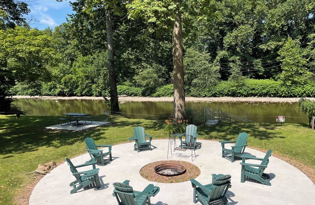 Creekfront getaway with hot tub and fire pit.