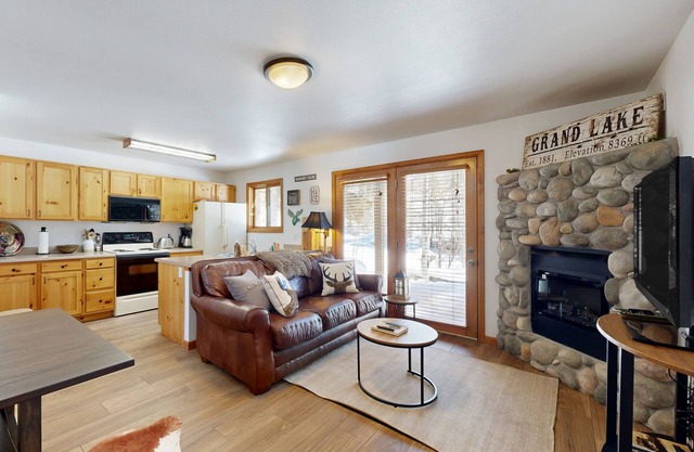 Creekside condo w/ patio, fireplace & open layout perfect for a group getaway