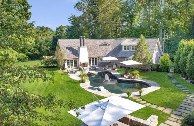 CT Retreat: Stunning, Expansive Compound with a Gorgeous Barn and Outdoor Pool