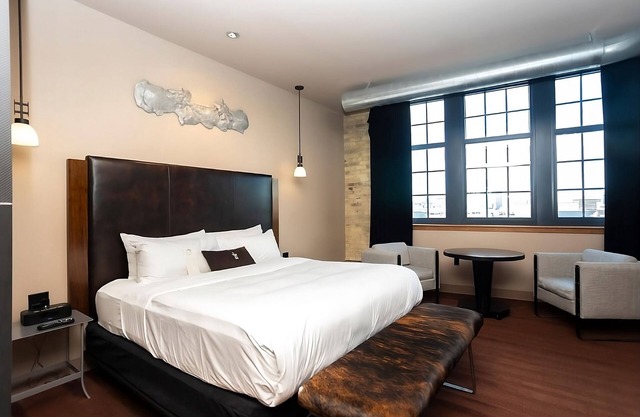 Custom Deluxe King at The Iron Horse Hotel, Short Drive To Erie Street Plaza!
