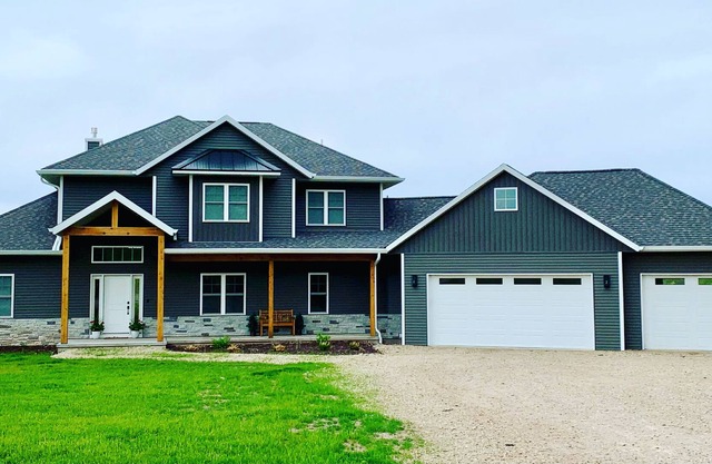 Custom New Home - Peaceful Setting only 15 min. from EAA!