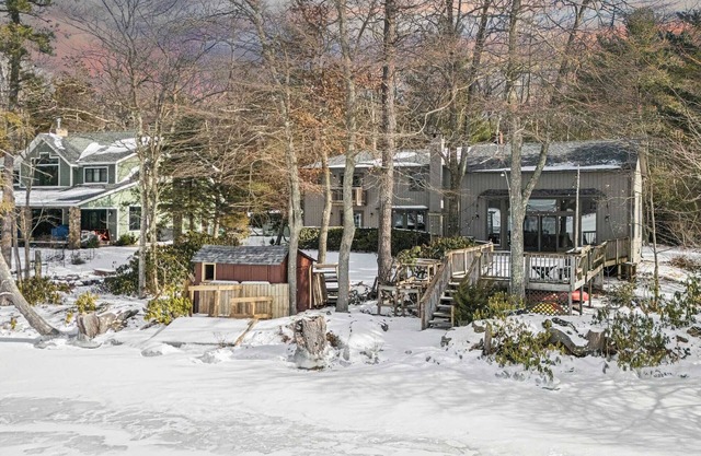 Deck w/ Lake Views, Fireplace, Shuffleboard, and Office Lakeside Retreat